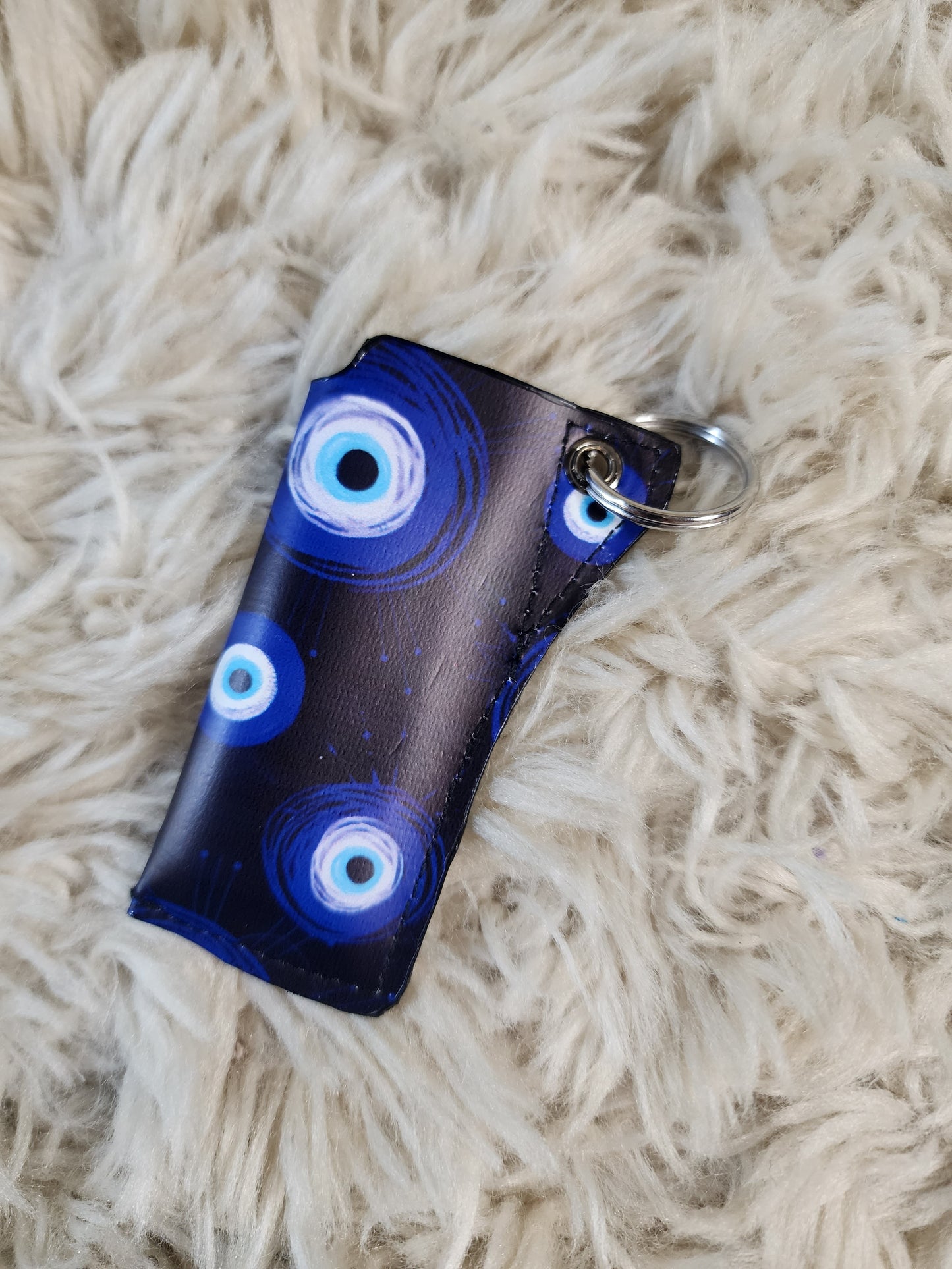 Evil eye keychain lighter
