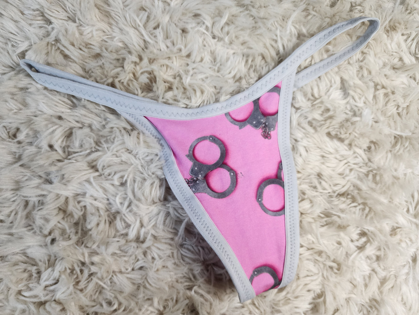 Large. Pink cuffs G-string