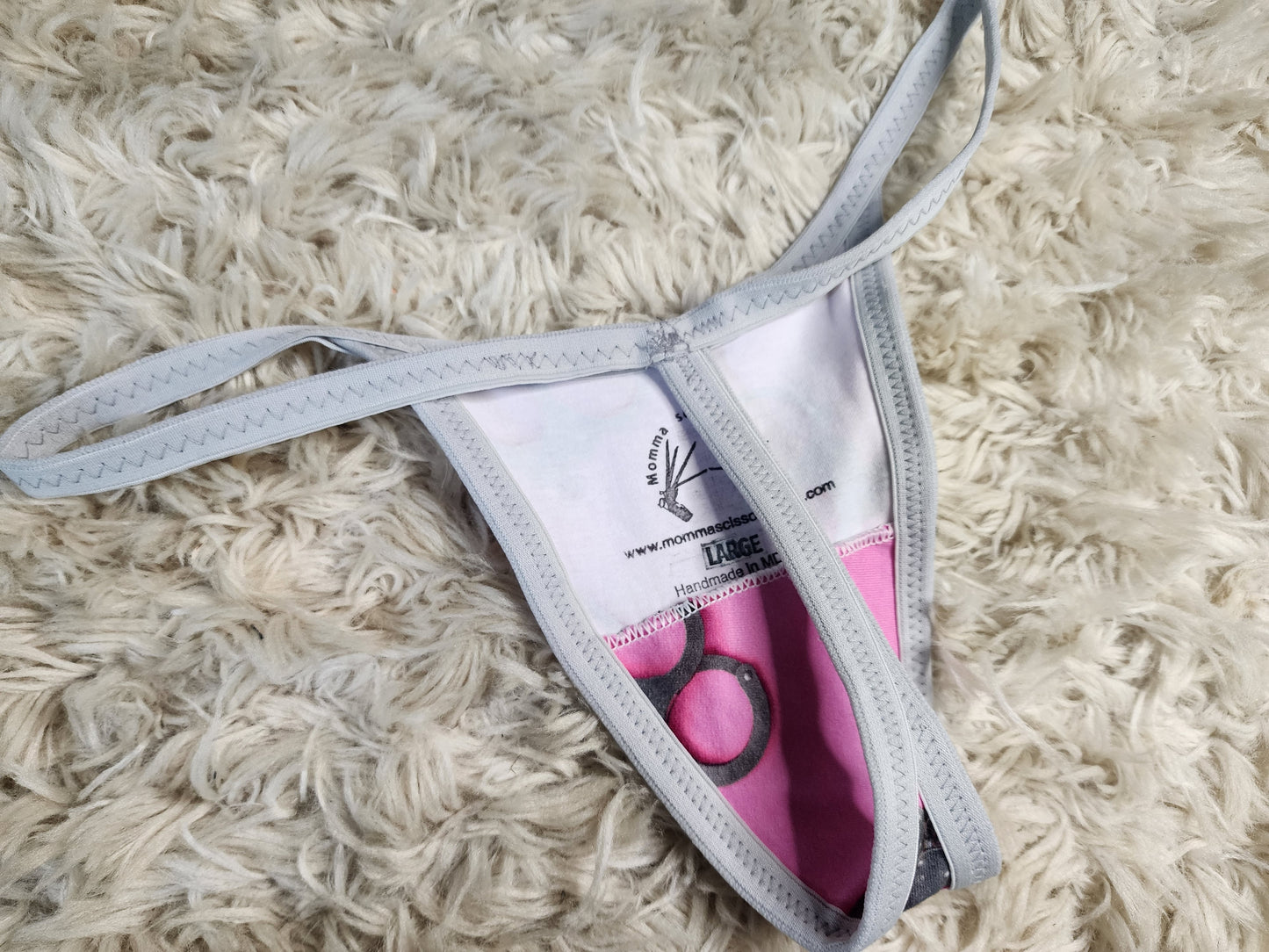 Large. Pink cuffs G-string