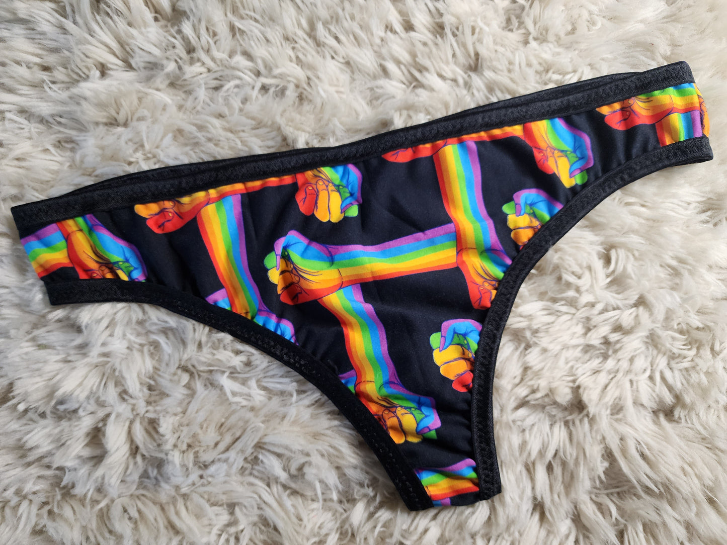 XL. Rainbow fist flat front thong