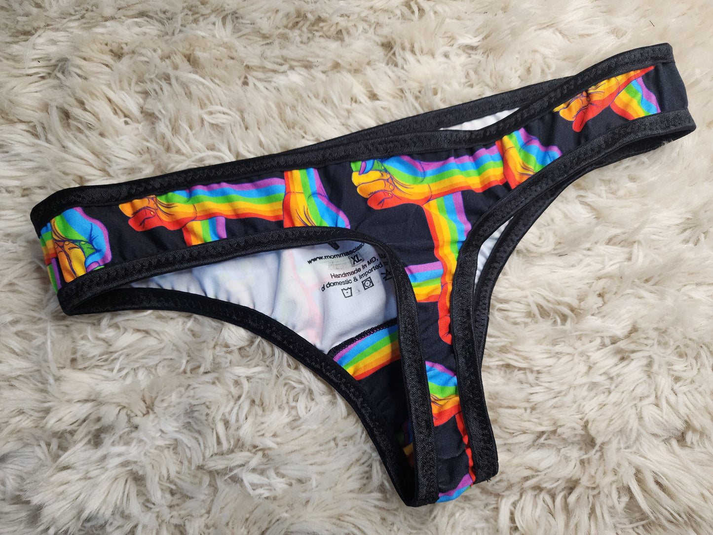XL. Rainbow fist flat front thong