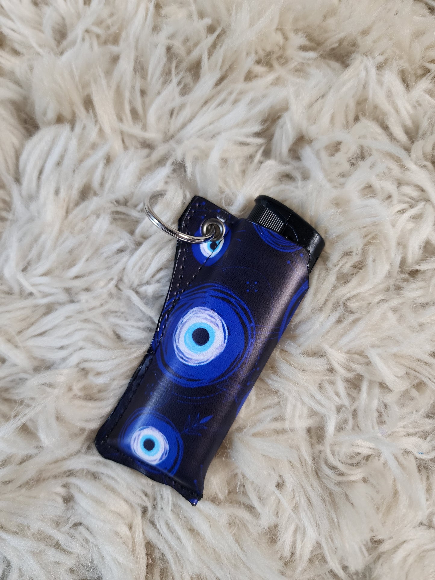 Evil eye keychain lighter