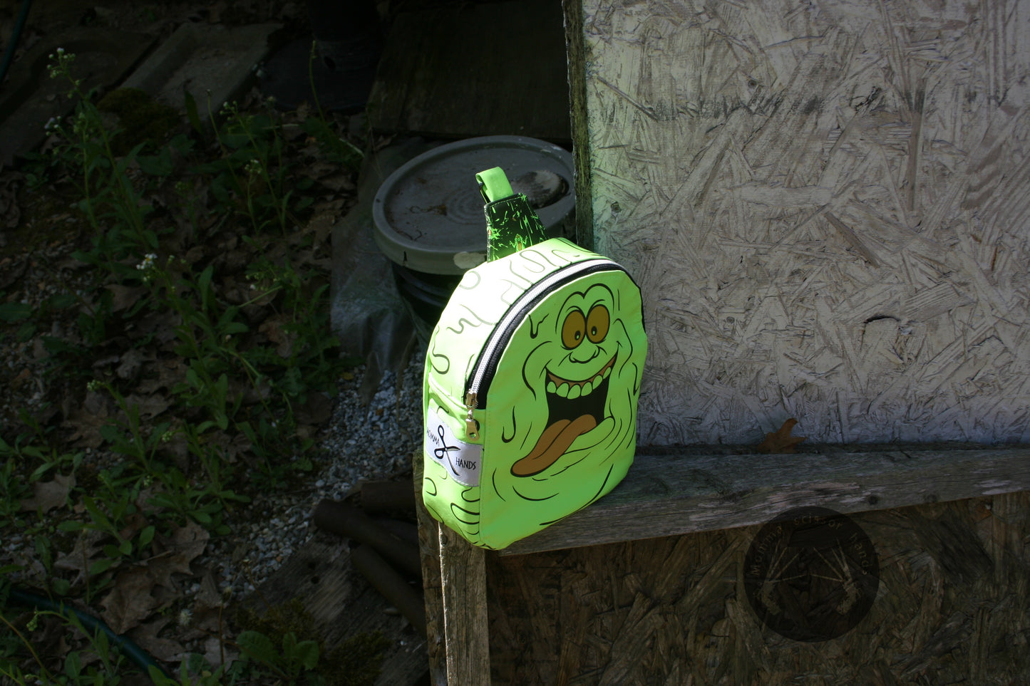 Glow in in the dark cross body slimer