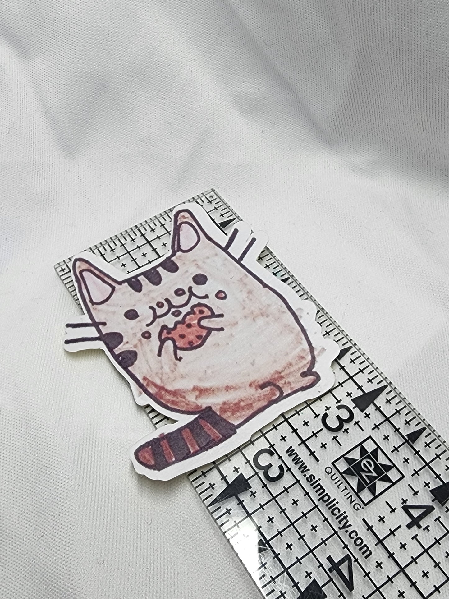 Pusheen Cat eating cookie sticker